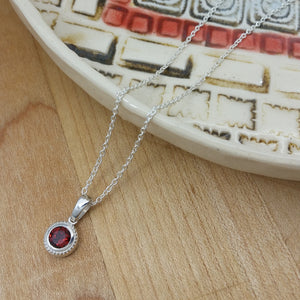 Push Present: Garnet Bezel Necklace