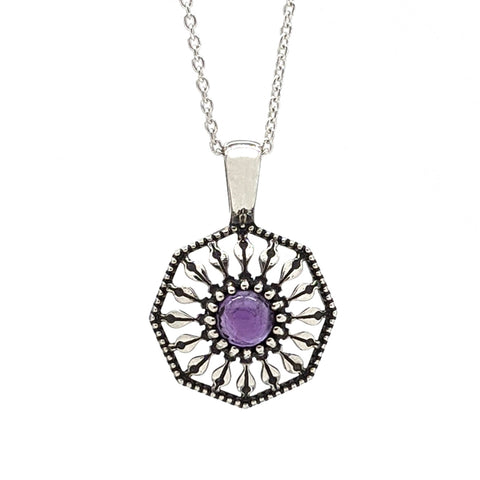 Sterling silver pendant necklace in an octagon shape with a round amethyst gemstone in the center.